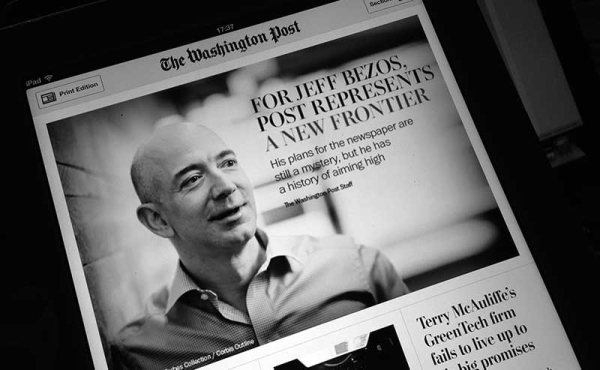 a front page of a newspaper with a man and a headline that says he cares about the paper