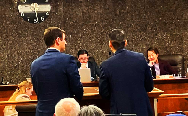 two people with their backs to us