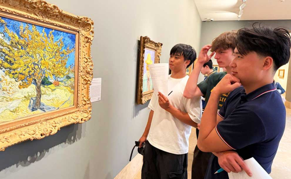 students admiring a painting
