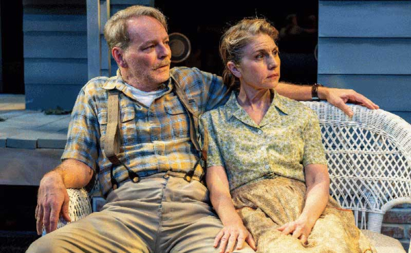 A man and a woman sitting