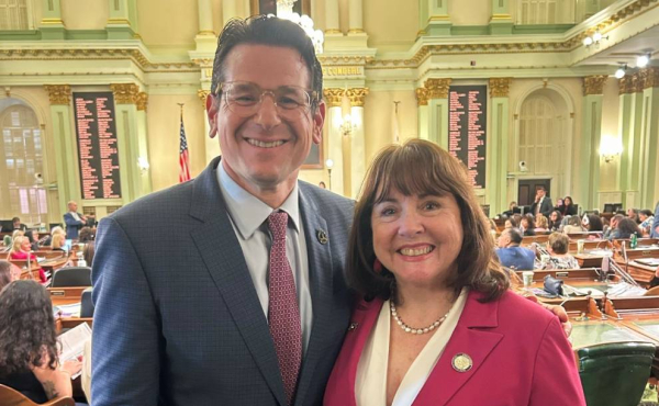 a man and a woman smiling