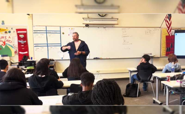 A teacher with students