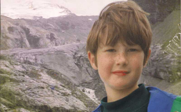 an old photo of a kid